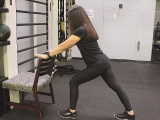 personal trainer showing office exercise